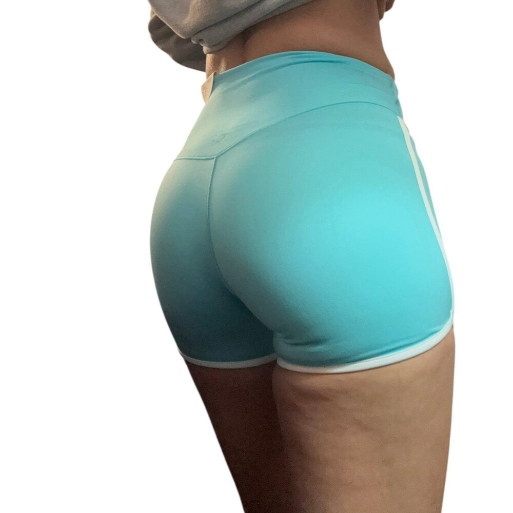 New Offline by Aerie Real Me 3" Bike Short in turquoise with white binding.